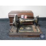 A mahogany cased Singer sewing machine