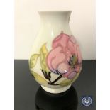 A Moorcroft vase, height 13.