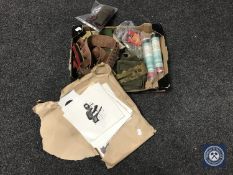 A box of military clothing, ammunition belt, brass button polisher, hand flares,