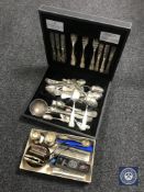 A canteen of Viner's Parish Collection cutlery together with a box of assorted crested teaspoons,