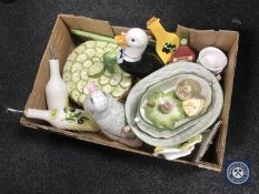 A box of assorted ceramics including duck figures, dishes,