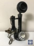 An early 20th century candlestick telephone