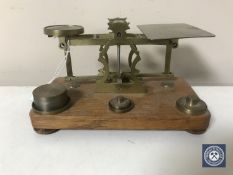 A set of vintage postal scales and weights