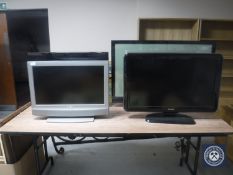 Four LCD and plasma TV's with continental wiring