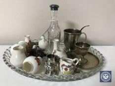 A glass trinket tray of Goss pieces, Wade whimsies,