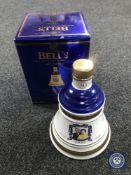A boxed Bells 70cl Scotch Whisky decanter - Queen Elizabeth II Golden Wedding Anniversary