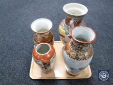A tray of four Japanese Kutani vases