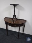 A shaped mahogany hall table and an inlaid wine table