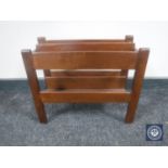 A mid 20th century teak magazine rack