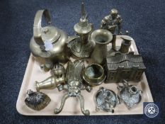 A tray of assorted brass ware, figure of a blacksmith, brass kettles, vases,