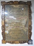 An Edwardian carved oak framed fretwork panel depicting The Lords Prayer