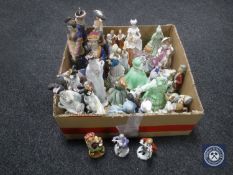 A box of assorted figures including Geisha,