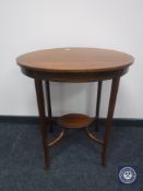 A Victorian inlaid mahogany occasional table