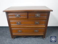 An Edwardian mahogany four drawer chest