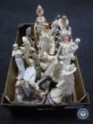 A box of contemporary Art Deco style figures