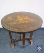 A folding Chinese style occasional table with galleon decoration