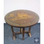 A folding Chinese style occasional table with galleon decoration