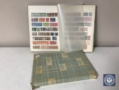 A stamp album containing early 20th century and later stamps of the world - China, Australia,