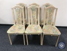 A set of six contemporary limed oak dining chairs