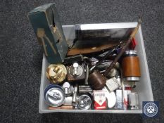 A box containing assorted table lighters and pocket lighters, penknives, hunting knife in sheath,