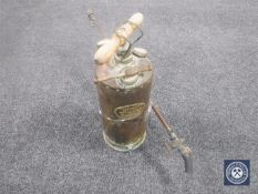 A vintage brass pump sprayer by Martineau & Smith