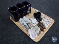 A tray of three Martel Grand National water jugs together with a collection of china shoes