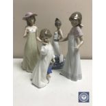 Four Nao figures of ladies (a/f)