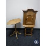 A continental oak pedestal occasional table,