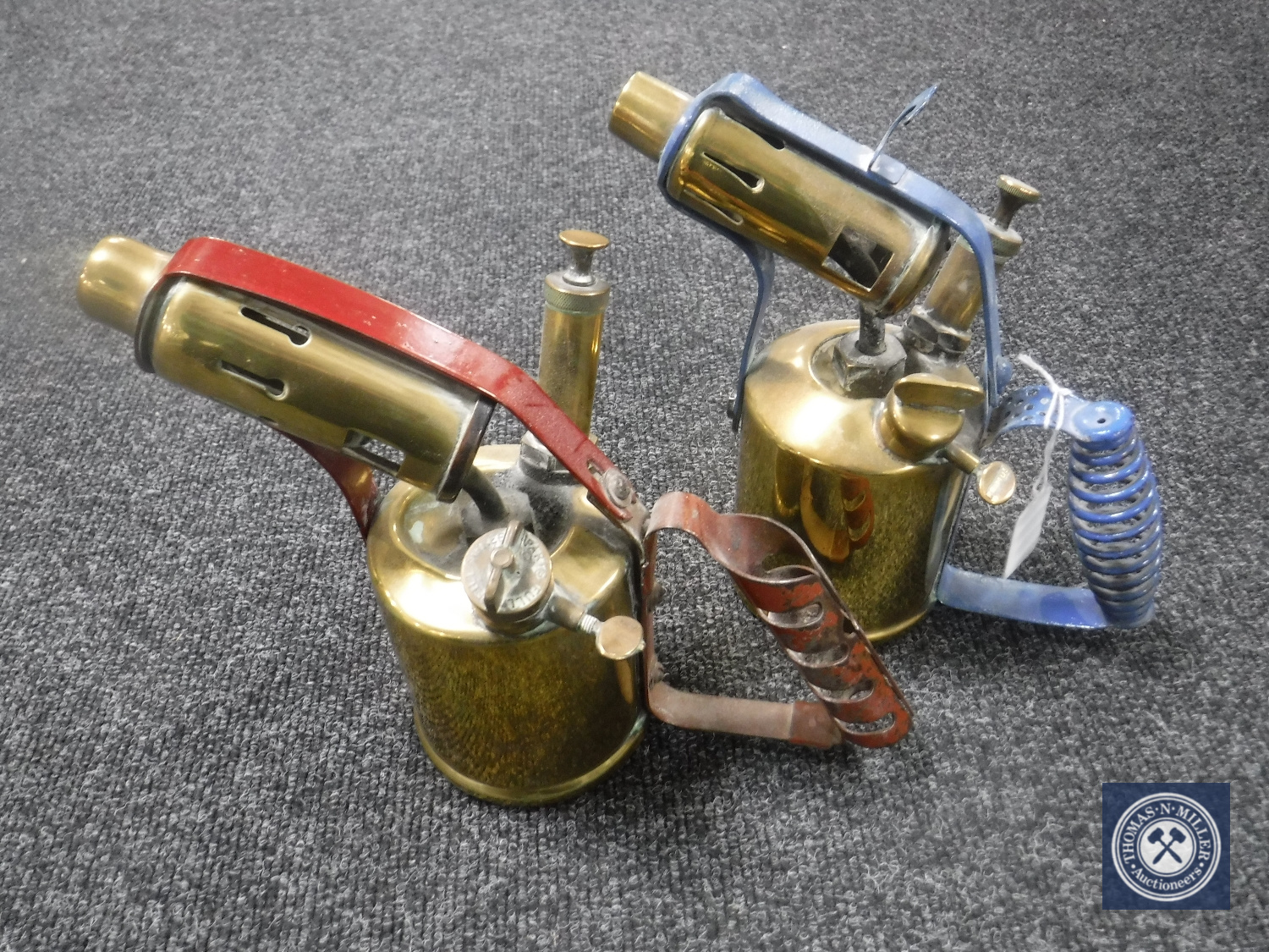 Two vintage brass blow lamps including a Monitor and Radius