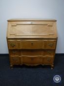 A continental oak writing bureau