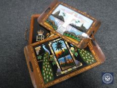 A Royal Marines commemorative twin handled tray together with two butterfly inlaid trays,