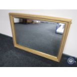 A gilt framed overmantel mirror