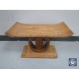 An Eastern mahogany stool