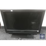 A Sony Bravia 26" LCD TV with remote