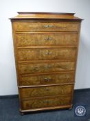 A late 19th century mahogany and walnut seven drawer chest on chest