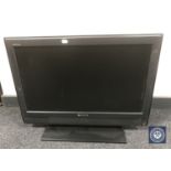 A Sony Bravia 26" LCD TV with remote