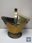 A Victorian brass coal bucket