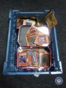 A crate containing a collection of Yu-Gi-Oh! cards