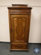 A continental mahogany side cabinet fitted two drawers,