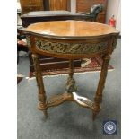 An ormolu mounted inlaid walnut circular occasional table,