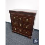 A mid 20th century mahogany three drawer chest