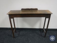 An oak side table with music stand