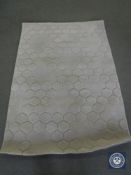 A hand tufted rug, embossed grey, 120 cm x 180 cm. rrp £297.