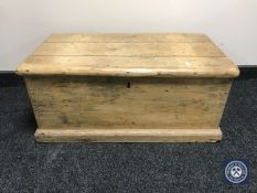 A small antique pine blanket box