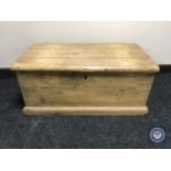 A small antique pine blanket box