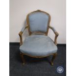 A continental armchair on cabriole legs in blue dralon