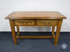 A contemporary inlaid two drawer hall table CONDITION REPORT: 120cm wide by 80cm