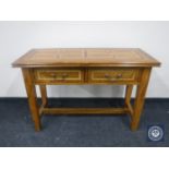 A contemporary inlaid two drawer hall table CONDITION REPORT: 120cm wide by 80cm