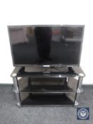 A Blaupunkt 32" LED TV on stand