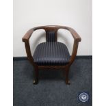 An early 20th century mahogany framed armchair